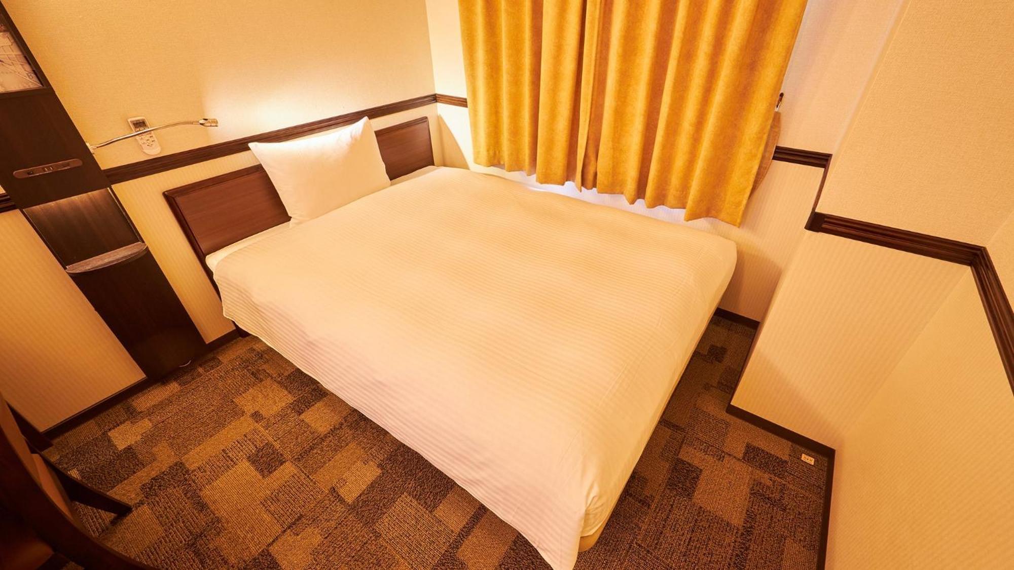 Toyoko Inn Tsu Eki Nishi Guchi Rum bild